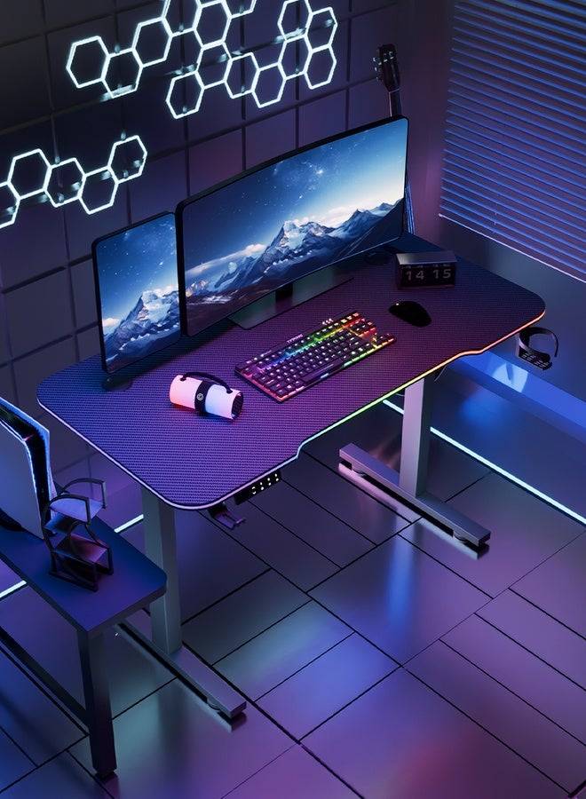 Gaming Desk, lifting Gaming Desk, intelligent electric lifting home computer table, specially designed for gaming competitions, equipped with desktop controller RGB lighting, headphone hooks, cup holder and socket box, carbon fiber texture, desktop size L120 * W60cm, adjustable height 73-118cm, black computer Desk